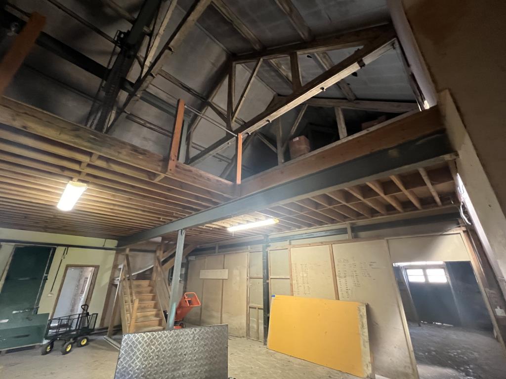 Lot: 70 - MULTI-FACETED RESIDENTIAL AND COMMERCIAL SITE WITH POTENTIAL - Internal photo of Unit 2 showing both floors